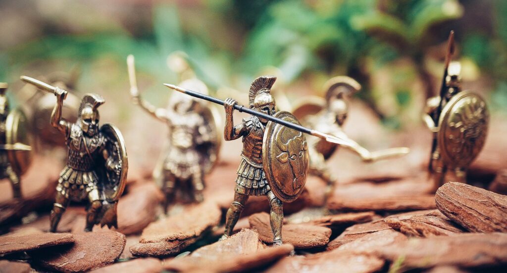 Gladiator figurine with weapons ready to battle