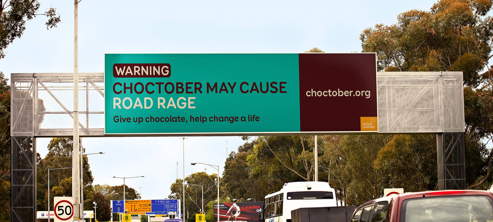 Reclink Choctober billboard warning may cause road rage give up chocolate, help change a life