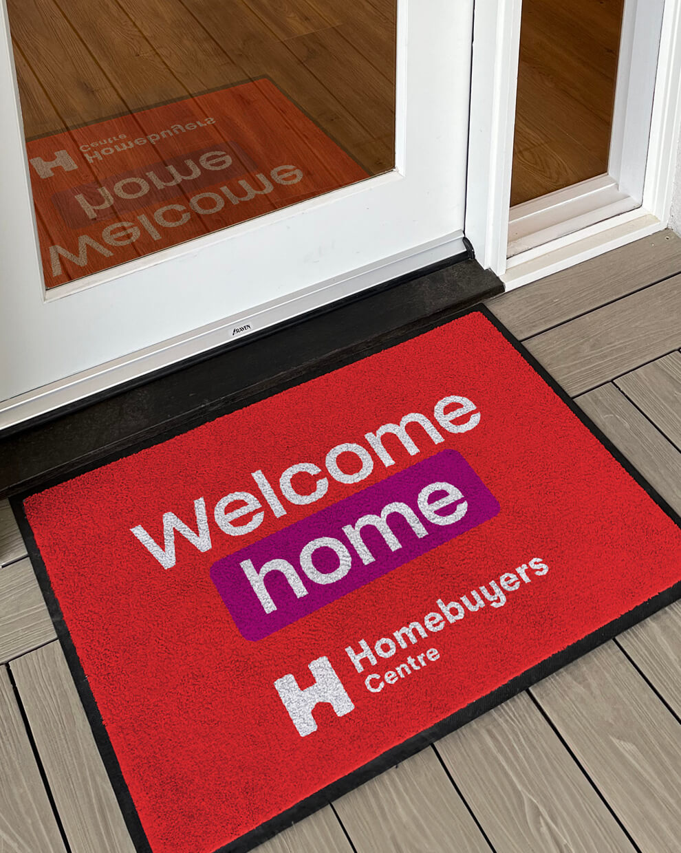Homebuyers Centre welcome home door mat