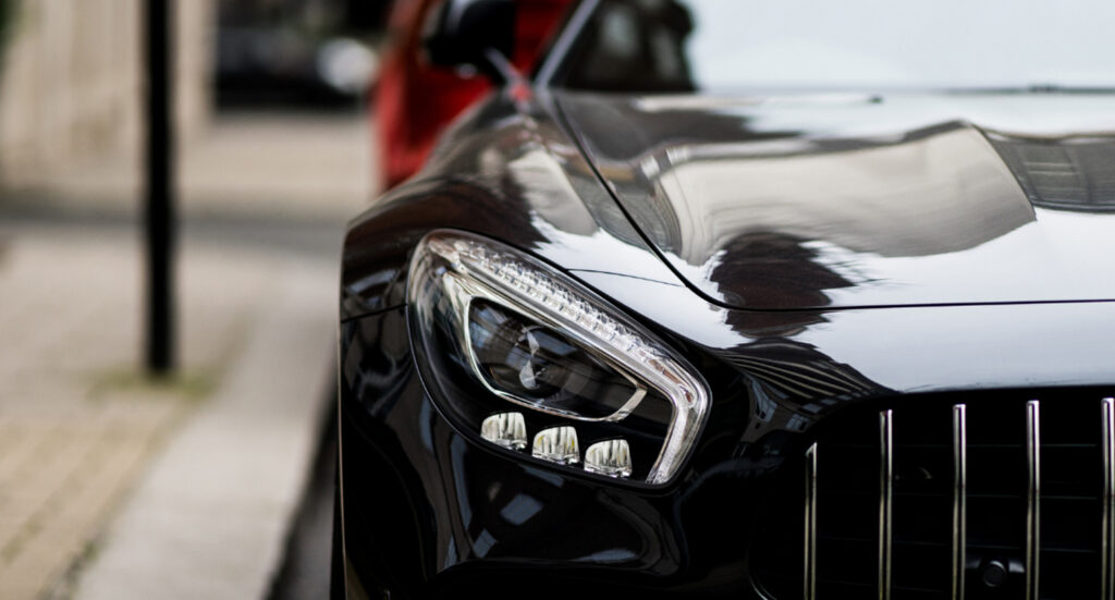 Close-up photo front of luxury car